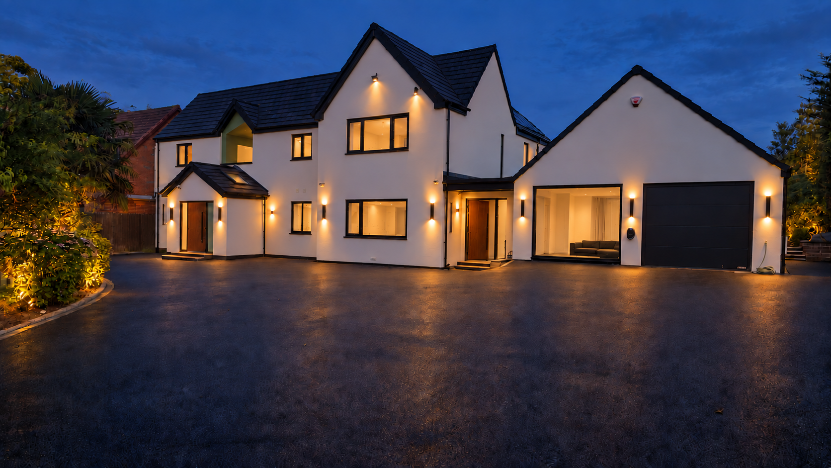 The real connected home in Leeds at blue hour with its smart lighting active